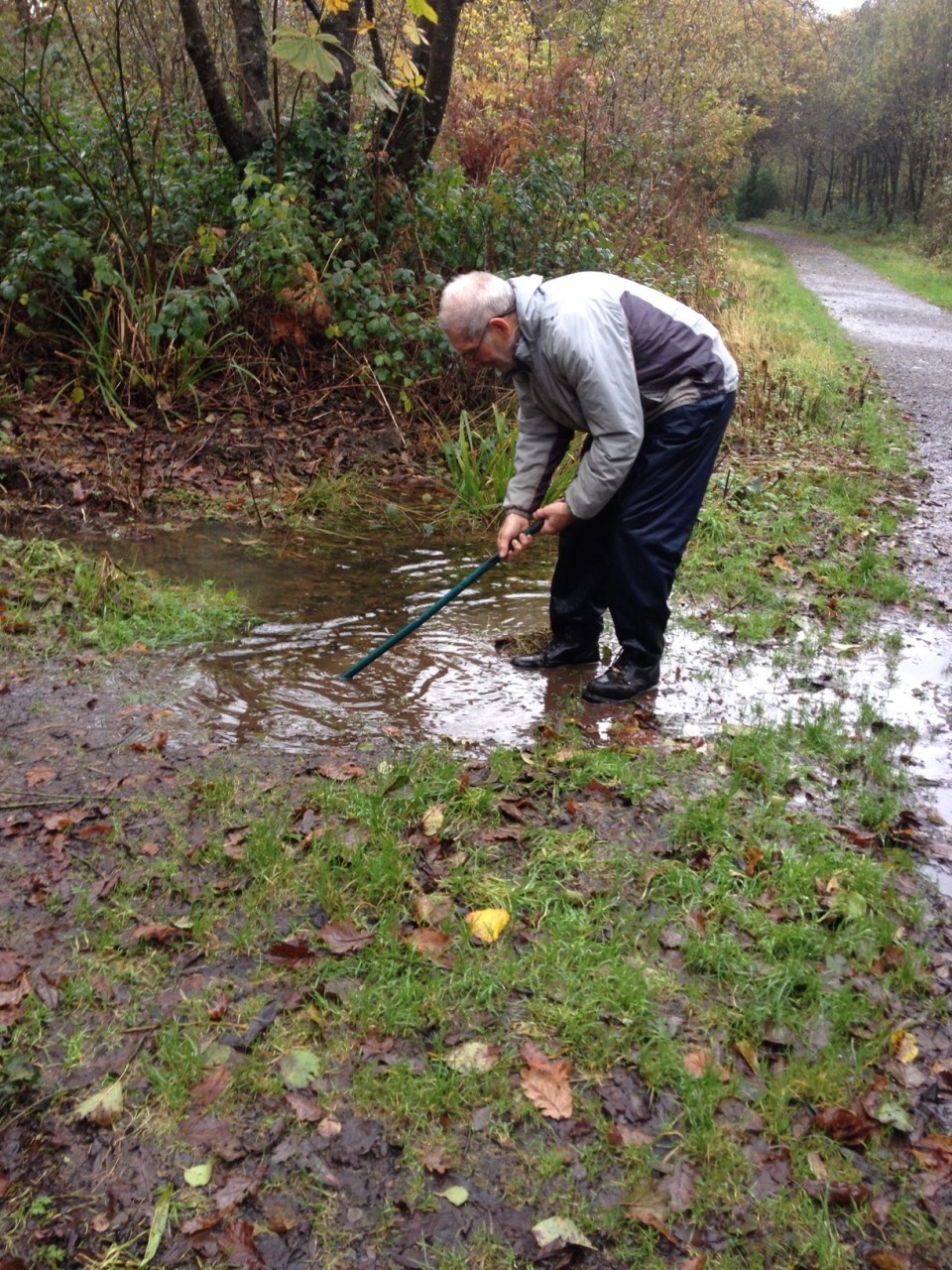 Roger clearing the drainage. Photo by Edward Tucker